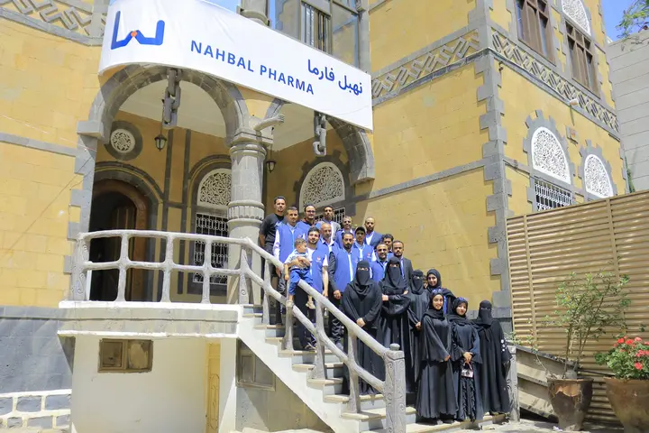 Nahbal Pharma team gathered outside the company office