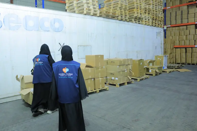 Nahbal team reviewing cartons after placement inside the warehouse